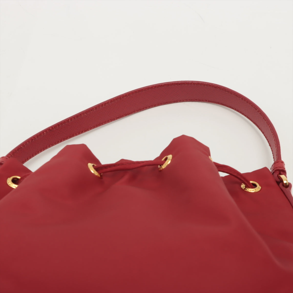 Prada red hotsell bucket bag