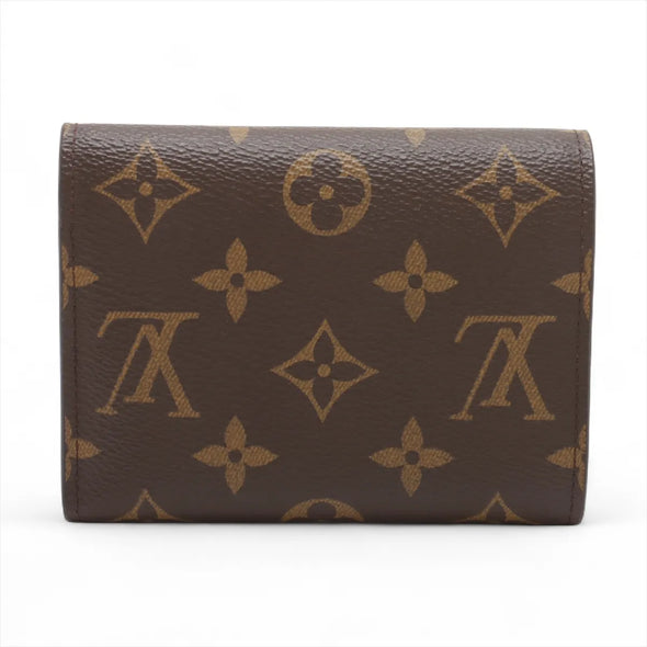 Fuchsia Monogram Canvas Victorine Wallet