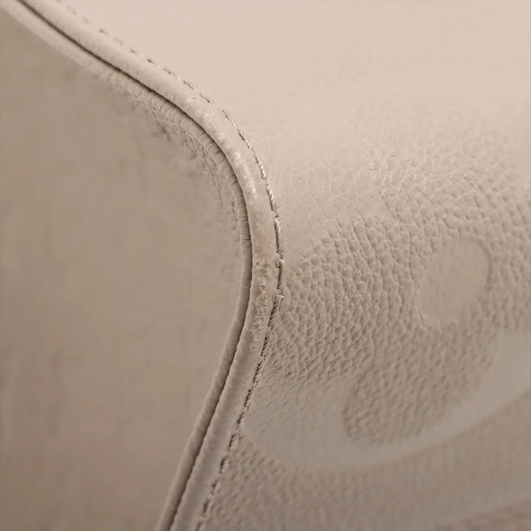 Louis Vuitton Beige Monogram Empreinte Leather OnTheGo MM [Clearance Sale]