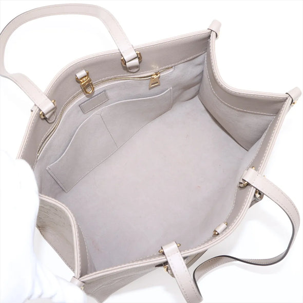 Louis Vuitton Beige Monogram Empreinte Leather OnTheGo MM [Clearance Sale]