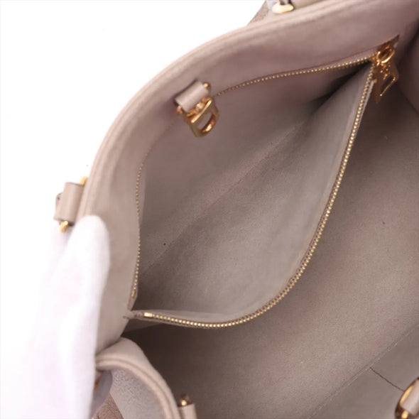 Louis Vuitton Bicolor Monogram Empreinte Leather OnTheGo PM [Clearance Sale]