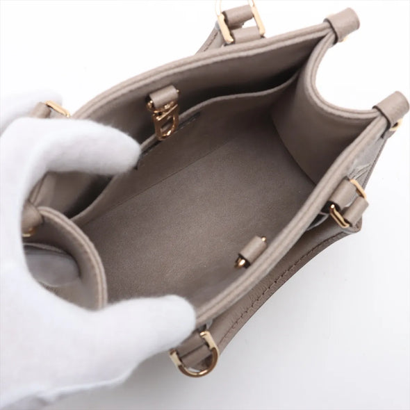 Louis Vuitton Bicolor Monogram Empreinte Leather OnTheGo PM [Clearance Sale]