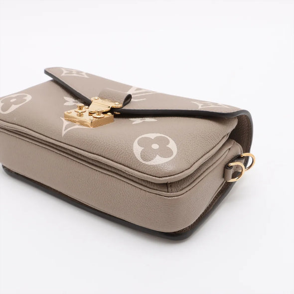 Louis Vuitton Toueterelle Creme Bicolor Monogram Empreinte Leather Pochette Metis East West [Clearance Sale]