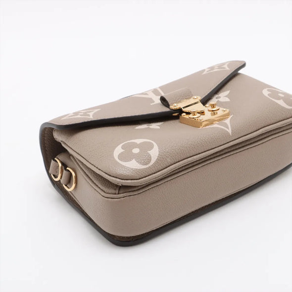 Louis Vuitton Toueterelle Creme Bicolor Monogram Empreinte Leather Pochette Metis East West [Clearance Sale]