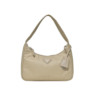 Beige Prada Re-Edition 2000 Nylon Mini Bag (Rented Out)