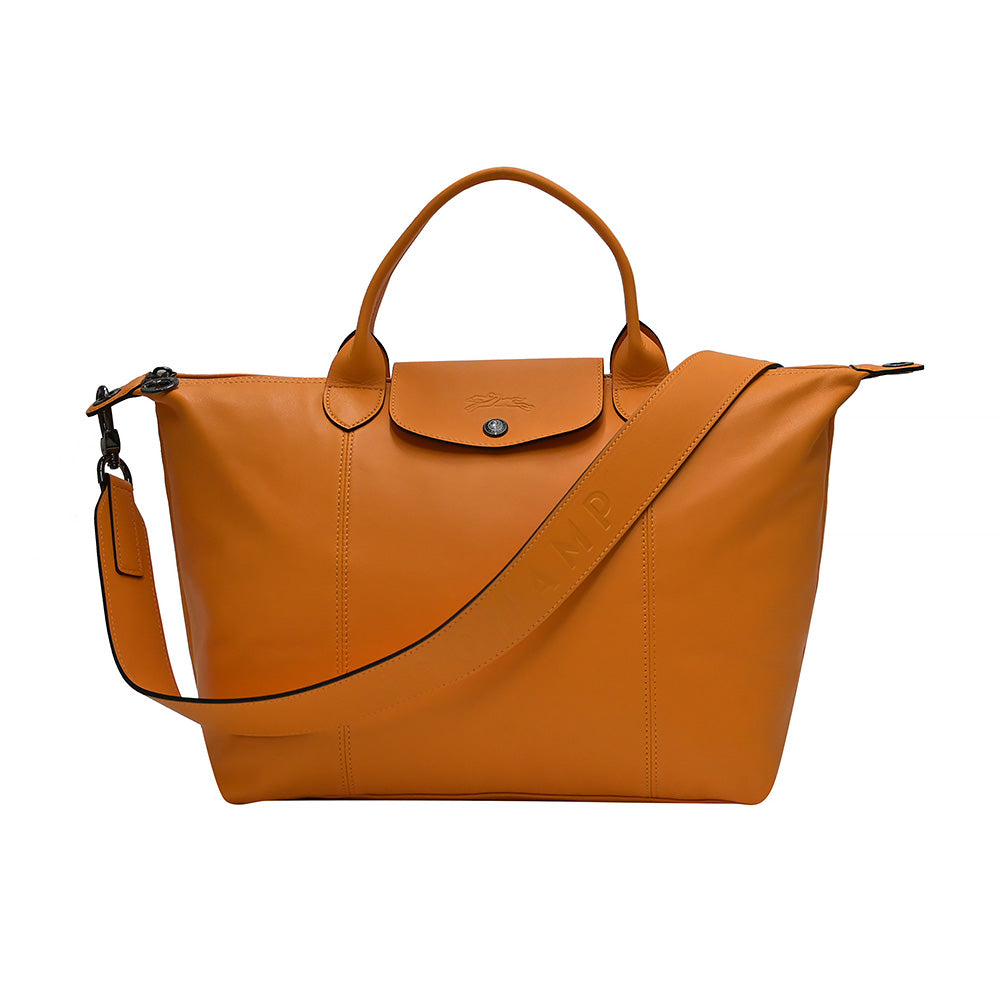 Shop Longchamp Le Pliage Cuir Medium Handbag with Strap